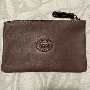 Genuine Roots leather zip pouch. New.